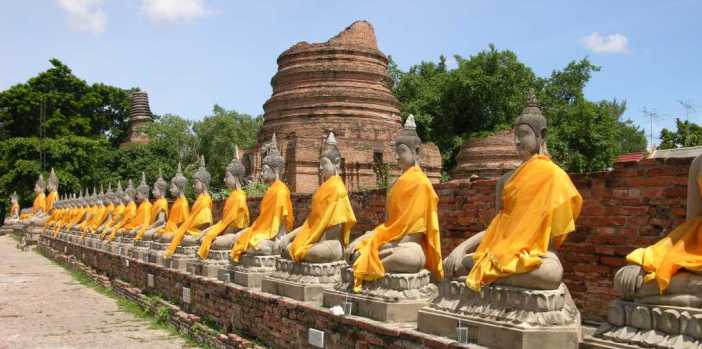 Ayutthaya-Wat-Yai-Chai-Mongkol-Row-of-Buddha-Statues.JPG